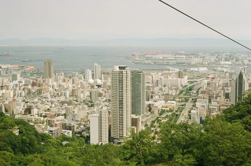 A city stretching towards distant mountains